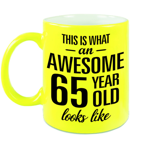 Awesome 65 year neon yellow mug 330 ml