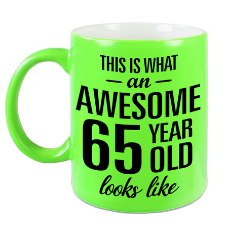 Awesome 65 year neon green mug 330 ml