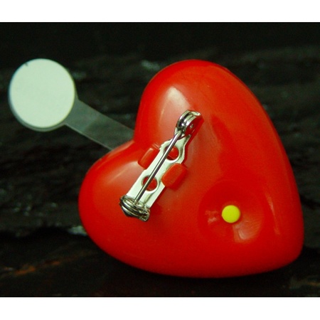 Heart shaped brooch with light